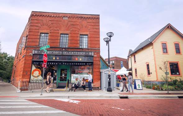 People walking outside Zingerman's Deli