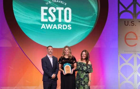 Mike Price, Sarah Miller, Amy Karbo holding ESTO Award