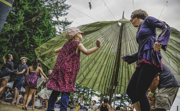 People of all ages dancing to the music.