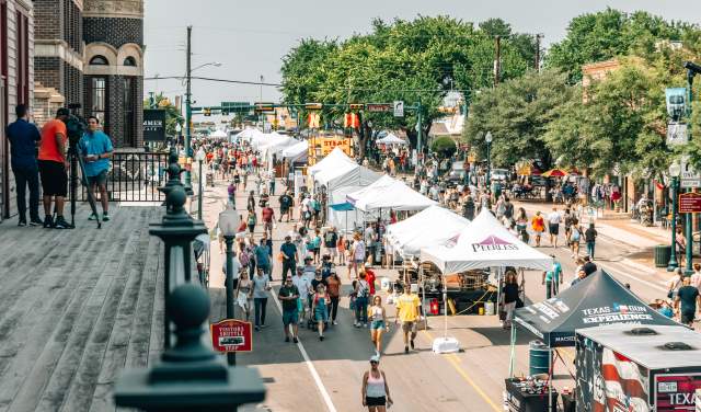 City of Grapevine Main Street festival showing vibrant community atmosphere