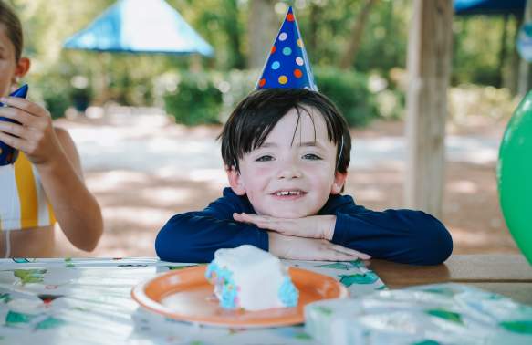 Child celebrating a birthday at a waterpark rental.