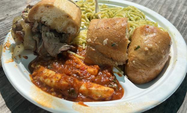 Pepper Steak Sandwich, Garlic Pasta con Pesto, Sauteed Calamari, and Garlic Bread