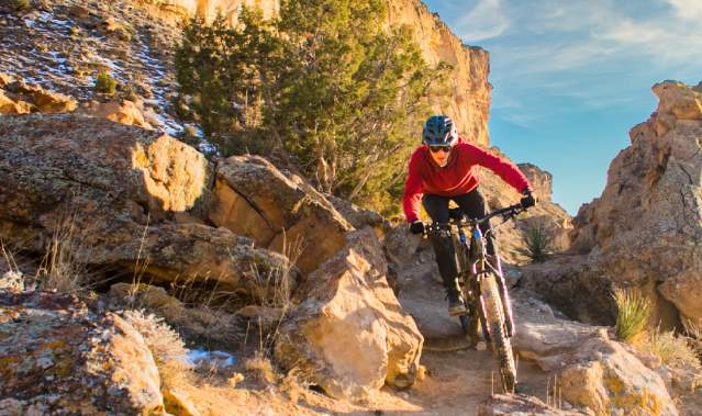 Mountain Biker Riding on Trails in the Winter