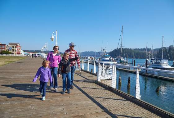 Family Enjoying Historic Old Town Florence's boardwalk.