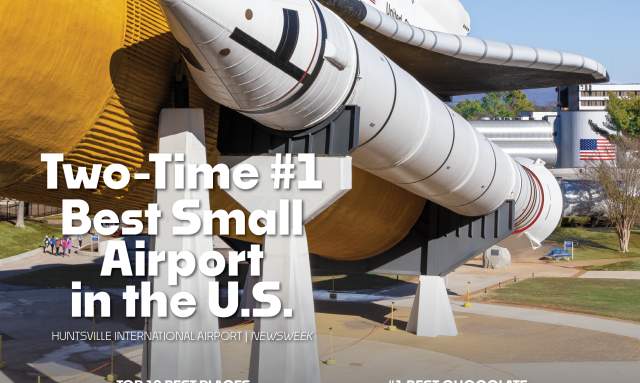 Photo of the space shuttle Explorer at the U.S. Space & Rocket Center on a bright sunny day with clear blue skies.