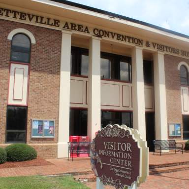 A front view image of the outside of the Person Street Welcome Center office building
