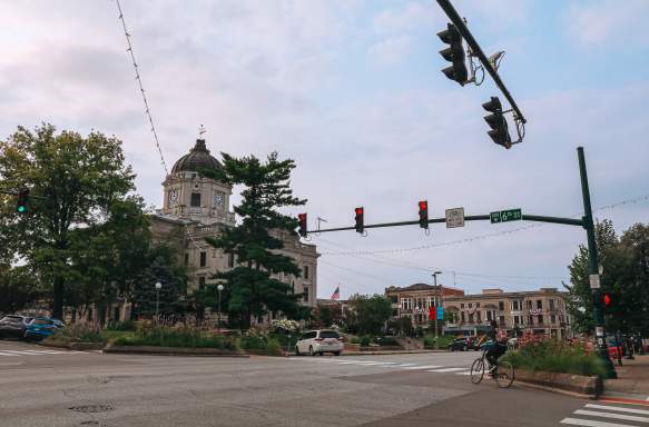 A person riding a bike on The Square