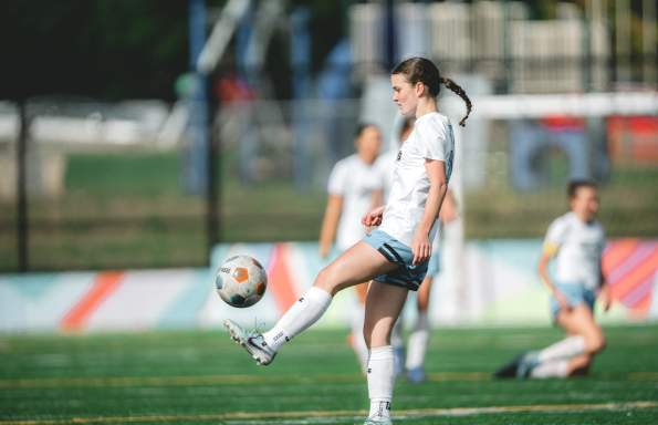 woman playing soccer