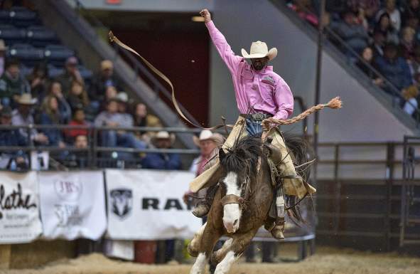 Cowboy riding Bronc at WRCA World Championship Ranch Rodeo