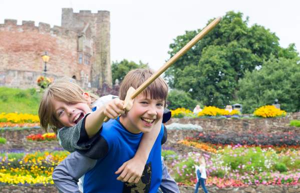 Tamworth Castle Grounds Summer boys roleplay piggyback