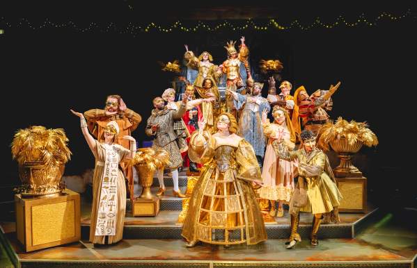 actors in costume on a stage