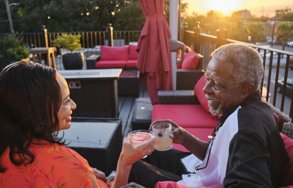 A couple at "Grace" rooftop bar in Downtown Mobile, AL.