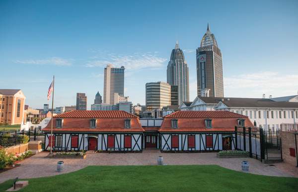 historic fort with high rise buildings in the background