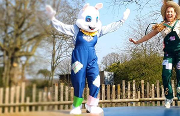 Easter Bunny and Farmer characters on outdoor jumping pillow at Lower Drayton Farm, Staffordshire