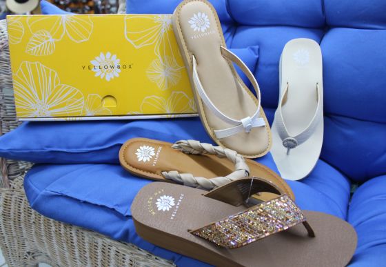 Yellow shoe store box flip flops