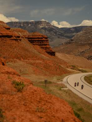 Two Motorcycles navigating along a winding road in Big Horn County Wyoming
