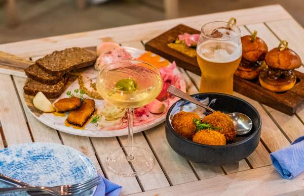 table with a variety of food an drink