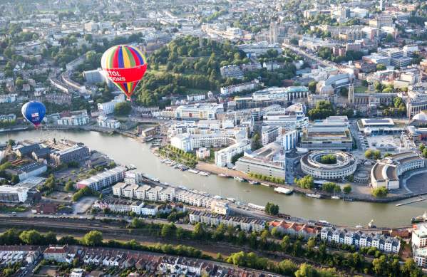 A balloon flying over Bristol Harbourside during the Bristol Balloon Fiesta - credit Paul Box