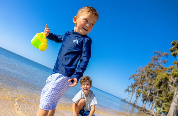 Boys playing at the beach