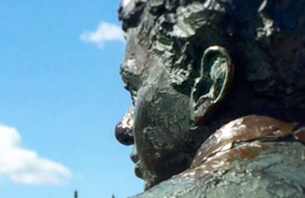 A close up of Dylan Thomas Statue