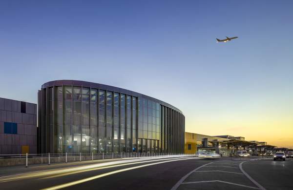 Austin airport east infill with plane flying overhead
