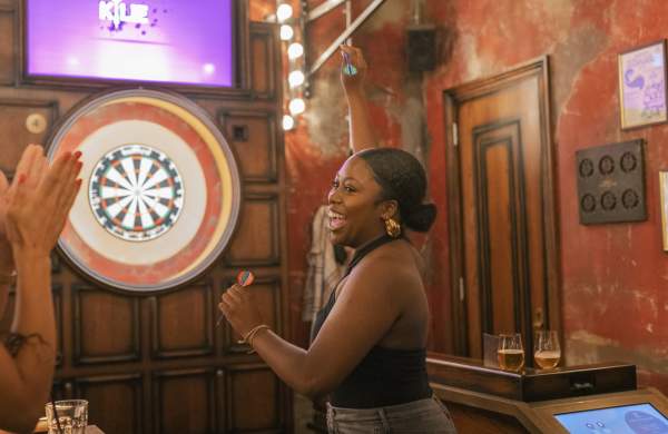 Person playing darts at Flight Club Bristol - credit Flight Club