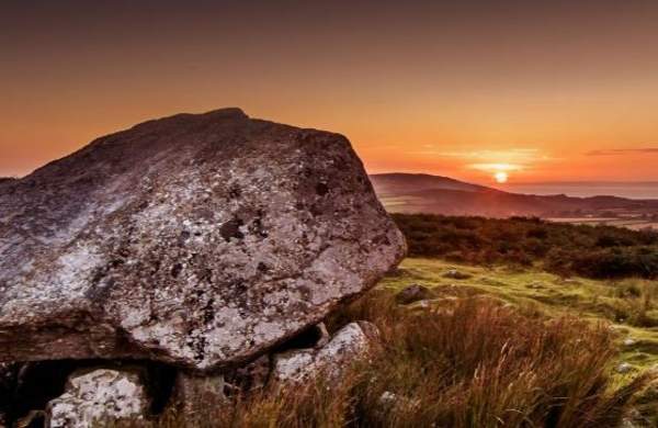 King Arthurs Stone in gower in the sunset