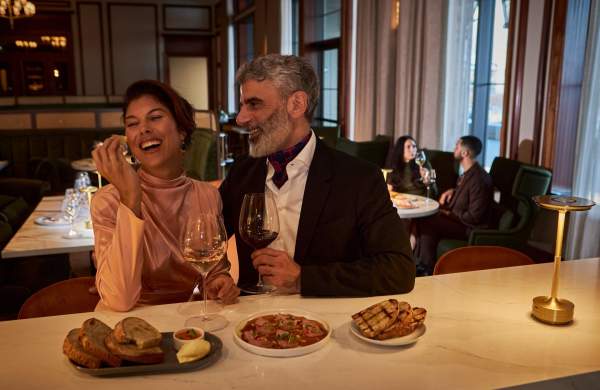 Couple sharing a meal in fine dining restaurant