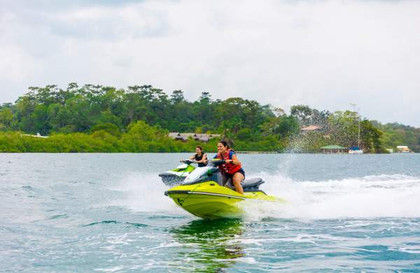 Friends doing water sport at Bocas del Toro province