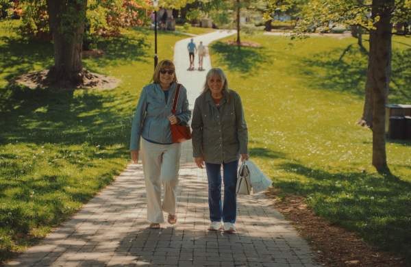 Old women walking on a park