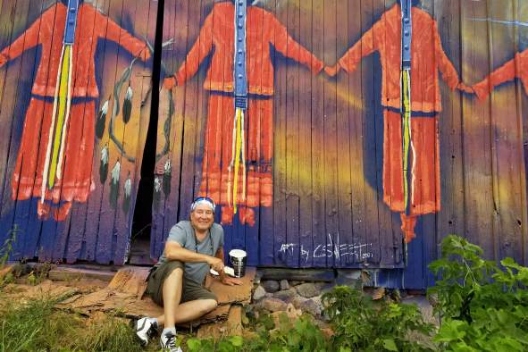 Get to know the artist behind "A Song for Seven Sisters" mural, Chris Sweet.