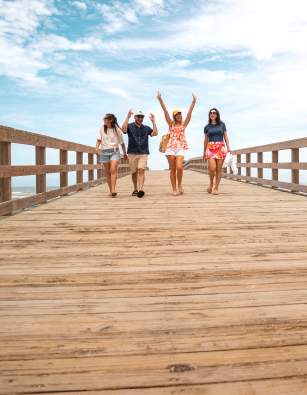 People walking on boardwalk