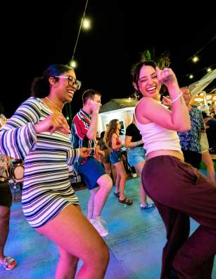 People dancing to live music