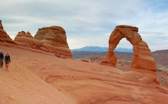 Hikers at Delicate Arch