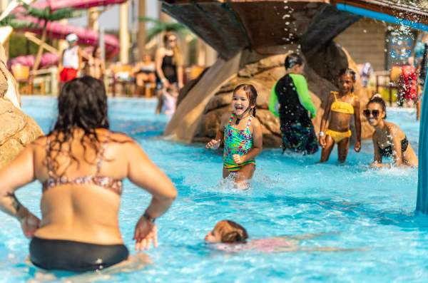 Families enjoy Parrot Island Waterpark pools during the summer.