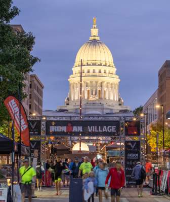 Ironman Village with the Capitol Building lit up behind it