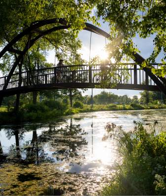 An image of the bridge that goes over the Yahara River at Tenney Park.