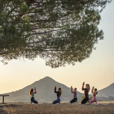 ladies doing yoga in outdoors
