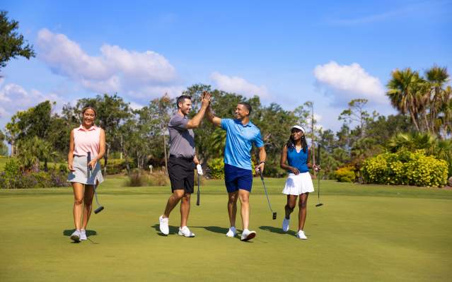 Foursome golfing at Riverwood Golf Club
