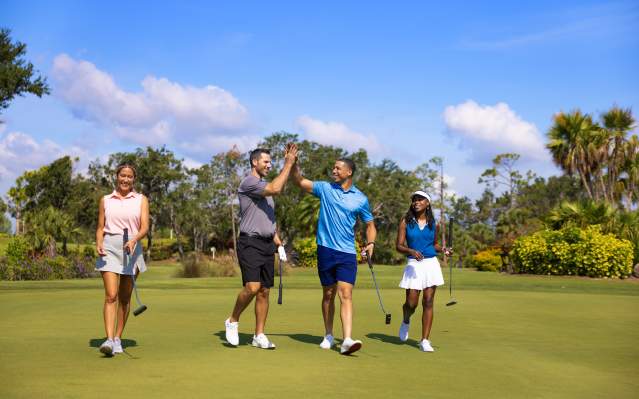 Foursome golfing at Riverwood Golf Club