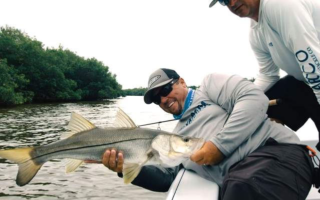 Capt. Jay Withers with a freshly caught Snook