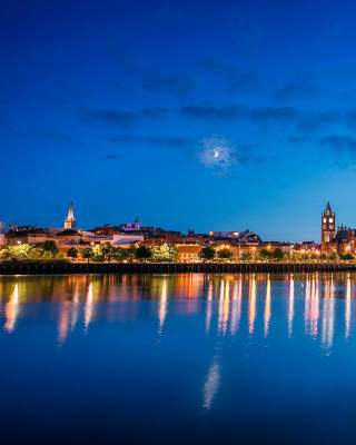 View of the peace bridge at night time towards Derry City