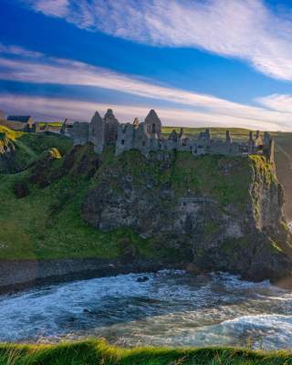 View of Dunluce Castle and Cliffs in County Antrim