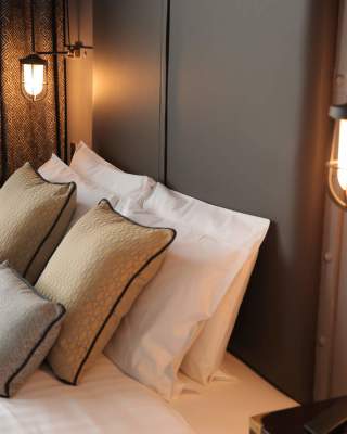 Modern, plush interior of a bedroom in the Titanic Hotel