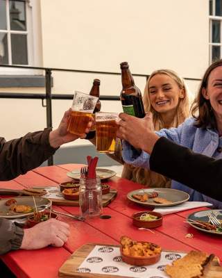 Group enjoying the beer masterclass at the Walled City Brewery in Derry~Londonderry