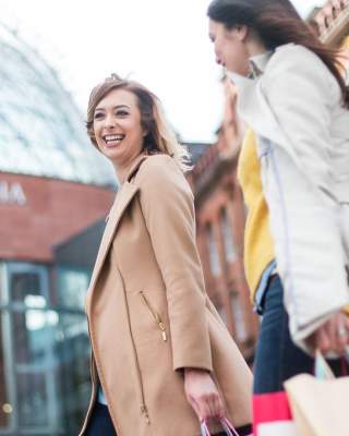 ladies shopping in Belfast, outside Victoria Square Shopping Centre.
