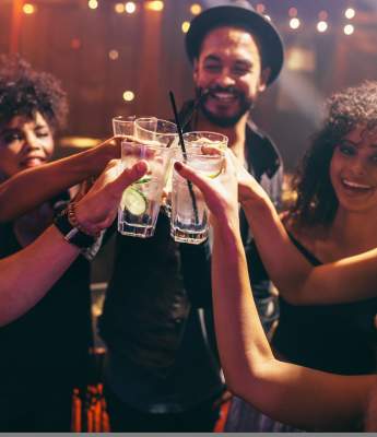 Group of people toasting at an event