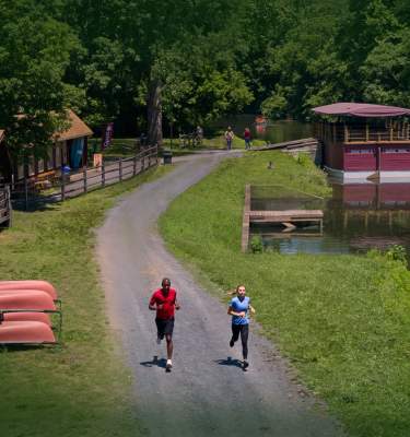 Runners along the Hugh Moore Canal at the National Canal Museum in Easton, PA