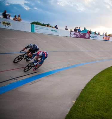 Two men cycling at the Valley Preferred Cycling Center Race Track