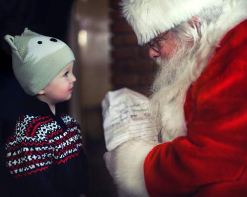 father christmas with a small bog